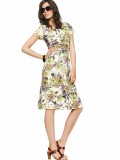 girl in short dress with glasses hand on hip
